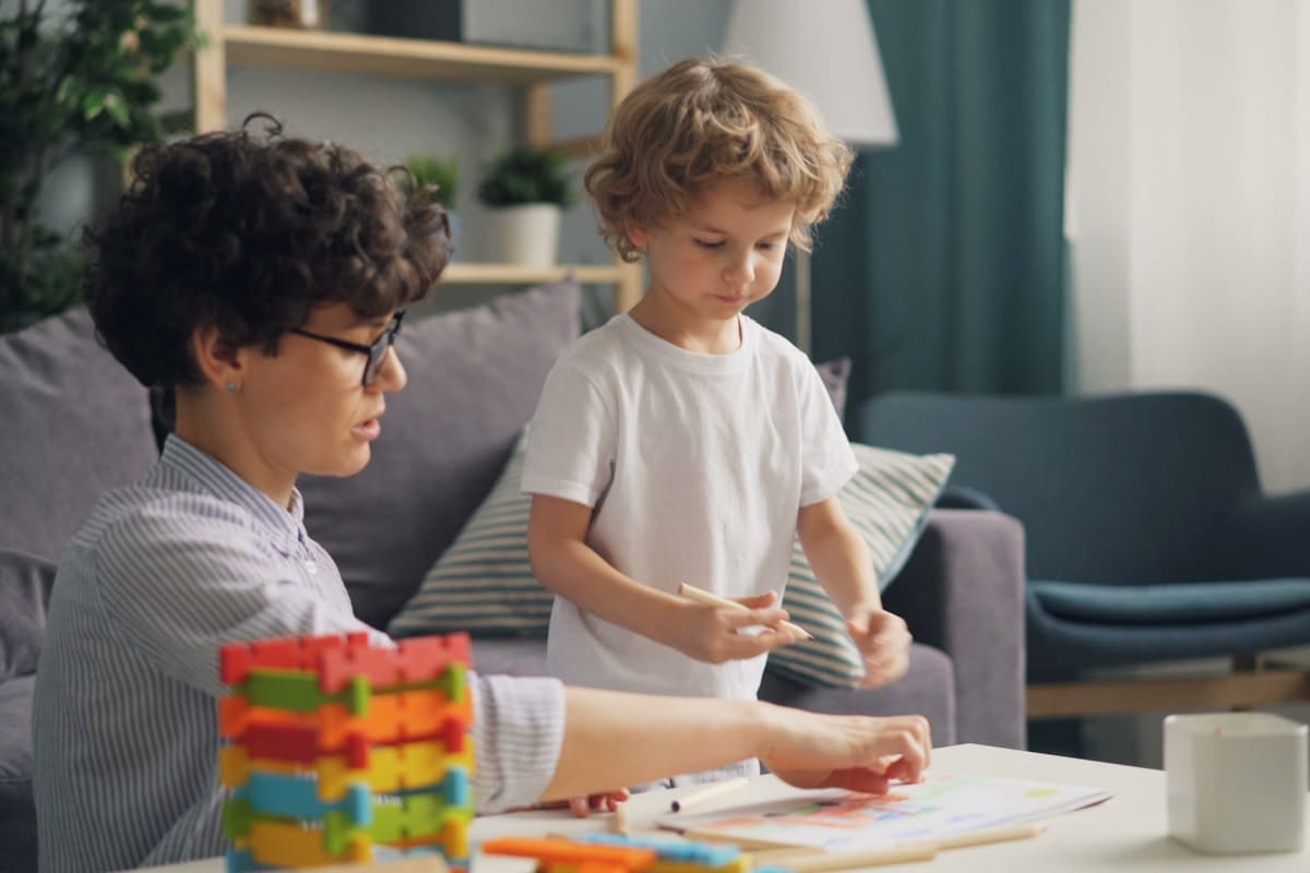 Early intervention ABA therapy session with young child and therapist